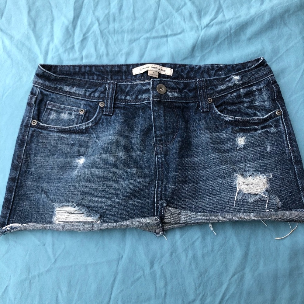 Distressed jean mini skirt